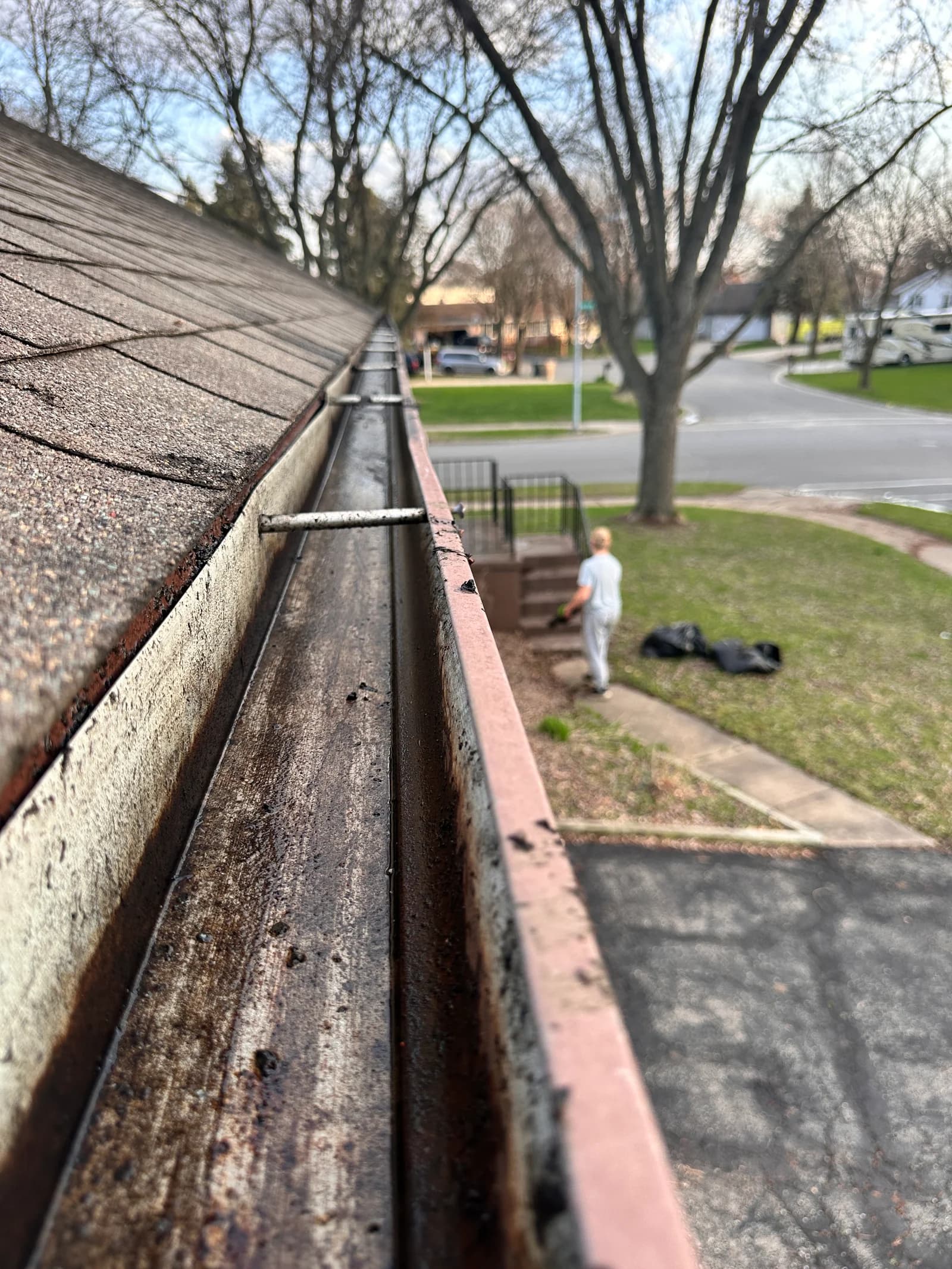 Same gutter cleaned out and flowing freely