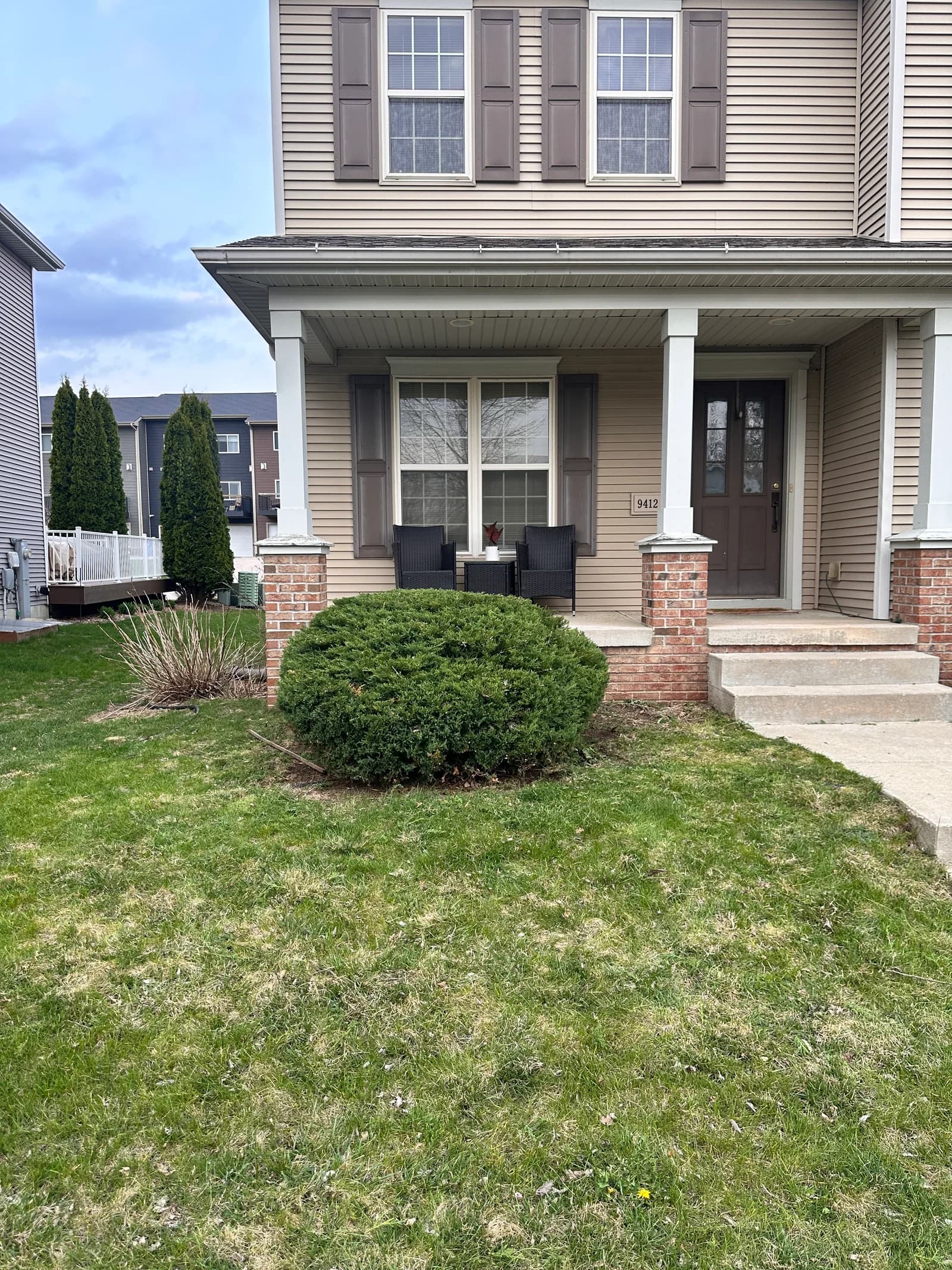 Neatly shaped bush restoring curb appeal after TotalGuard pruning
